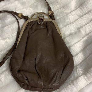 Vintage Italian Leather light brown oval crossbody purse. Made in Italy